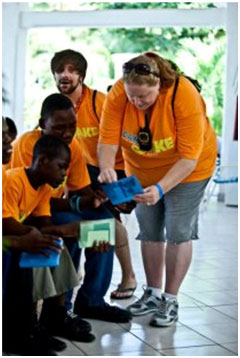 Dr. Caroline Carsen working with campers
